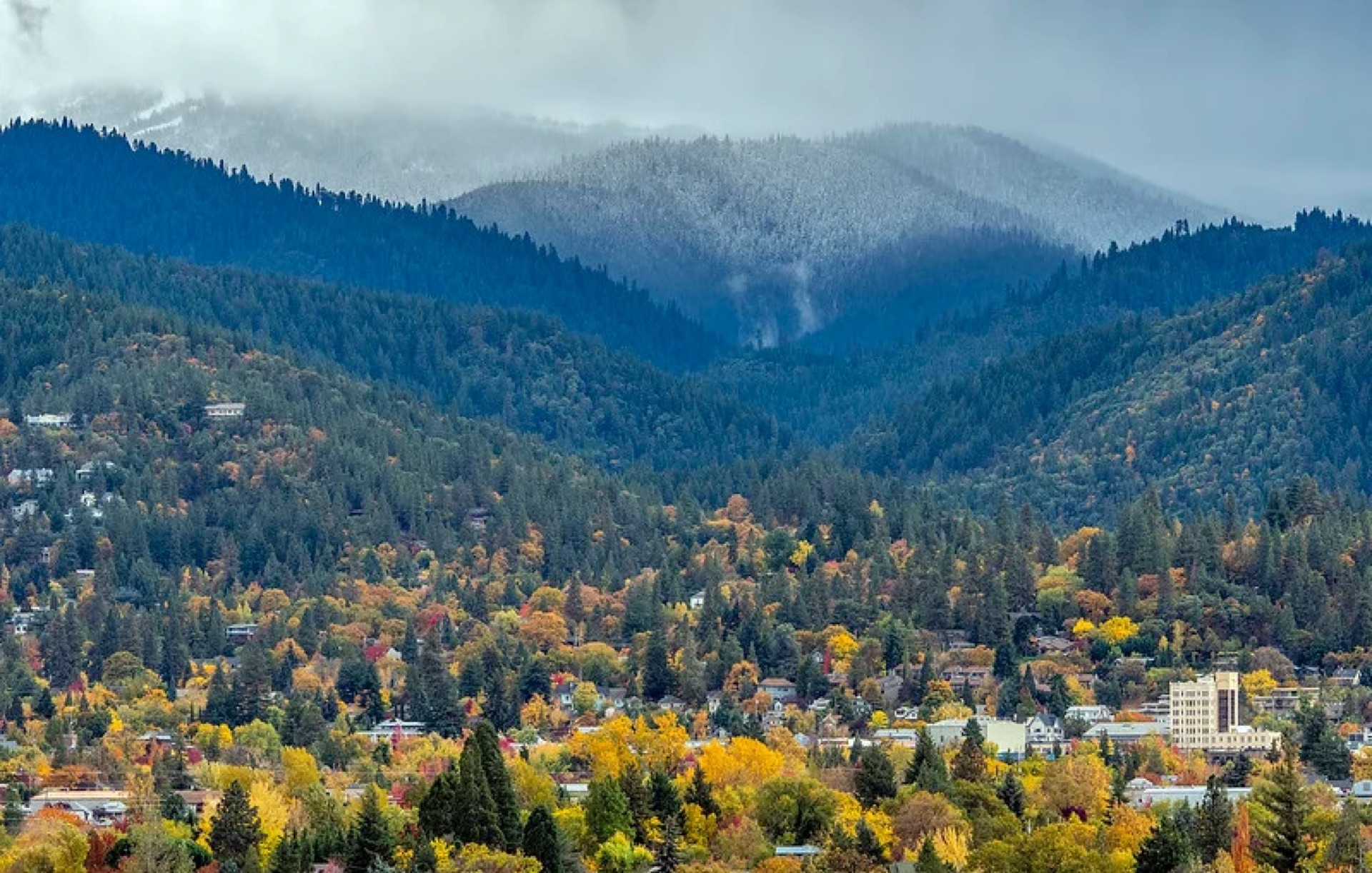 Ashland in autumn, with the town below snow-dusted Rogue Valley ridges